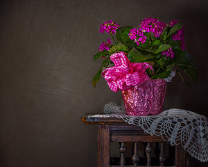 Flowers on an Antique Table