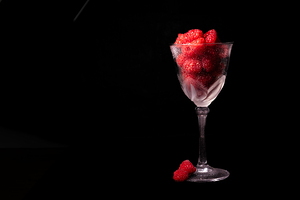 Raspberries in a Wine Glass