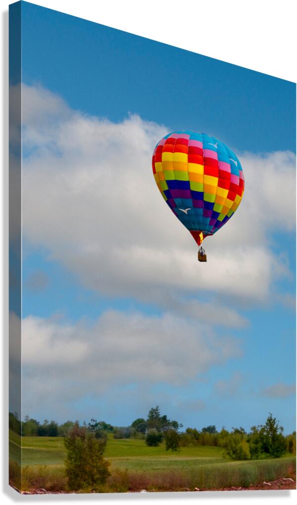 Hot Air Balloon Floating Over the Countryside Canvas Print