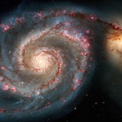 The Whirlpool Galaxy – A Cosmic Dance of Light and Gravity