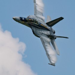 US Navy F18 Super Hornet Races through the Sky