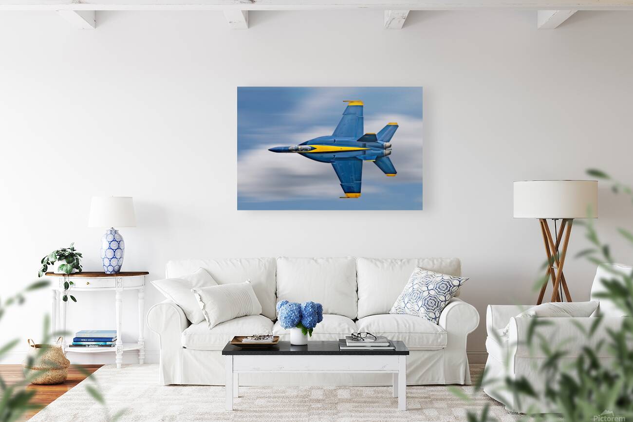 US Navy F-18 Super Hornet of the Blue Angels races across the sky Reproduction