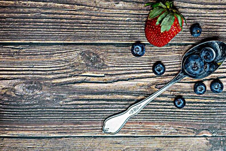 Berries and Spoon by Pisarek Photography